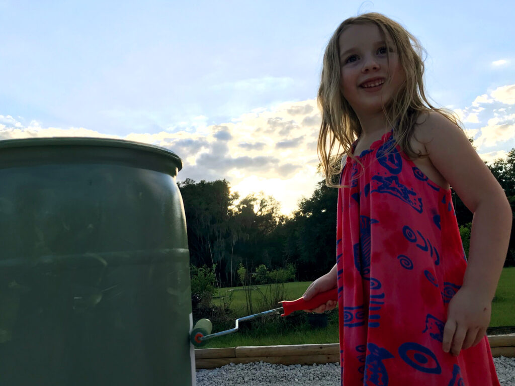 Kaylee painting a barrel 3