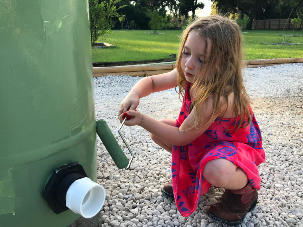 Kaylee painting a barrel 2